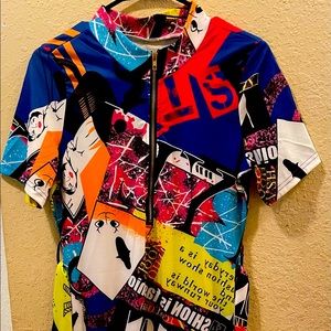 Multi-Color Dress size Large has good stretch and wrap belt included.